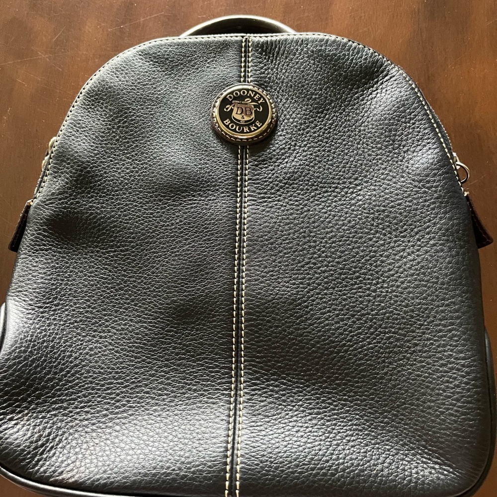 Dooney & Bourke Black pebbled grain.